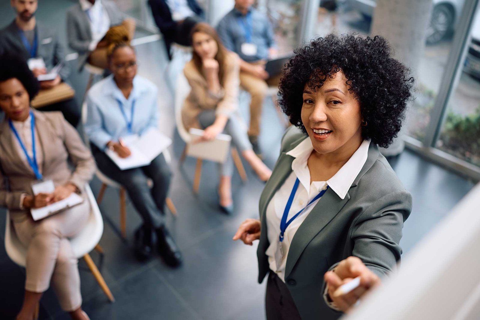 woman-leads-presentation-for-team.jpg